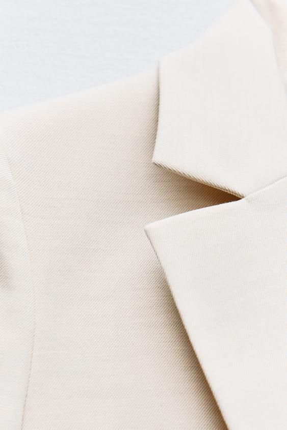 BLAZER AJUSTÉ AVEC ÉPAULETTES