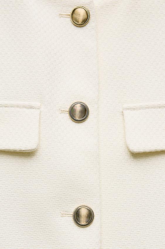 BLAZER EN PIQUÉ À COL ROND
