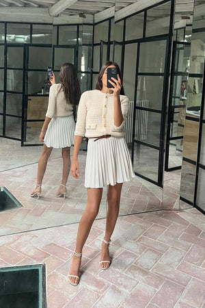 JUPE COURTE PLISSÉE AVEC CEINTURE