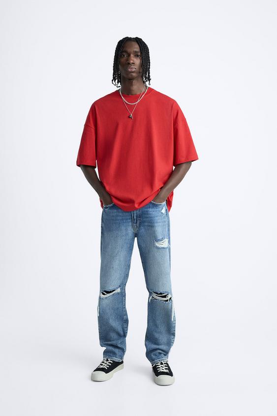 T-SHIRT À INSCRIPTION DÉFORMÉE